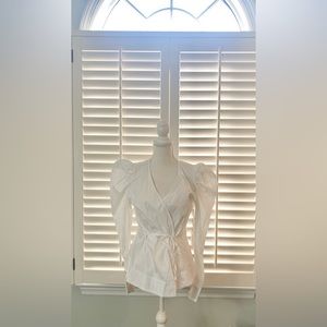 Jason Wu new with tags. Size medium. Puff sleeve wrap top
